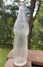Buster Carbonated Beverage, 8 oz clear soda bottle picture