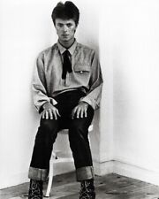 David Bowie seated wearing western style boots and clothing 1970's 8x10 photo picture