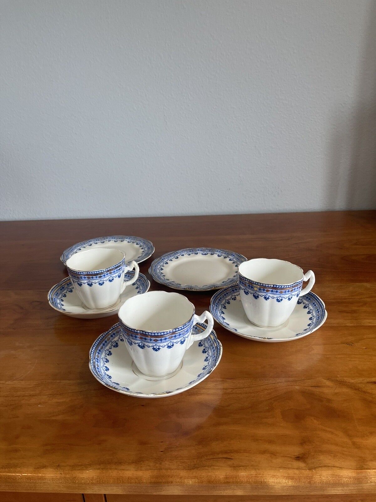 Antique lovely set of 3 blue, white & gold teacups & saucers with 2 small plates