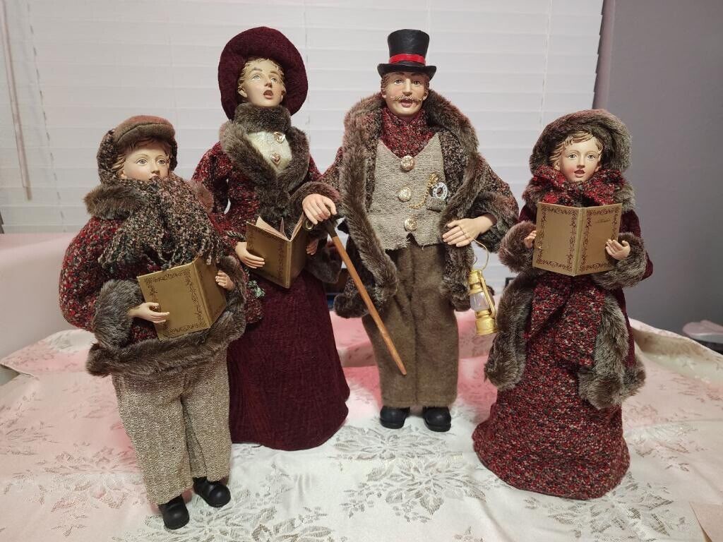 Carolers figurines 4 Christmas real clothing  resin. The tallest 20” Rare