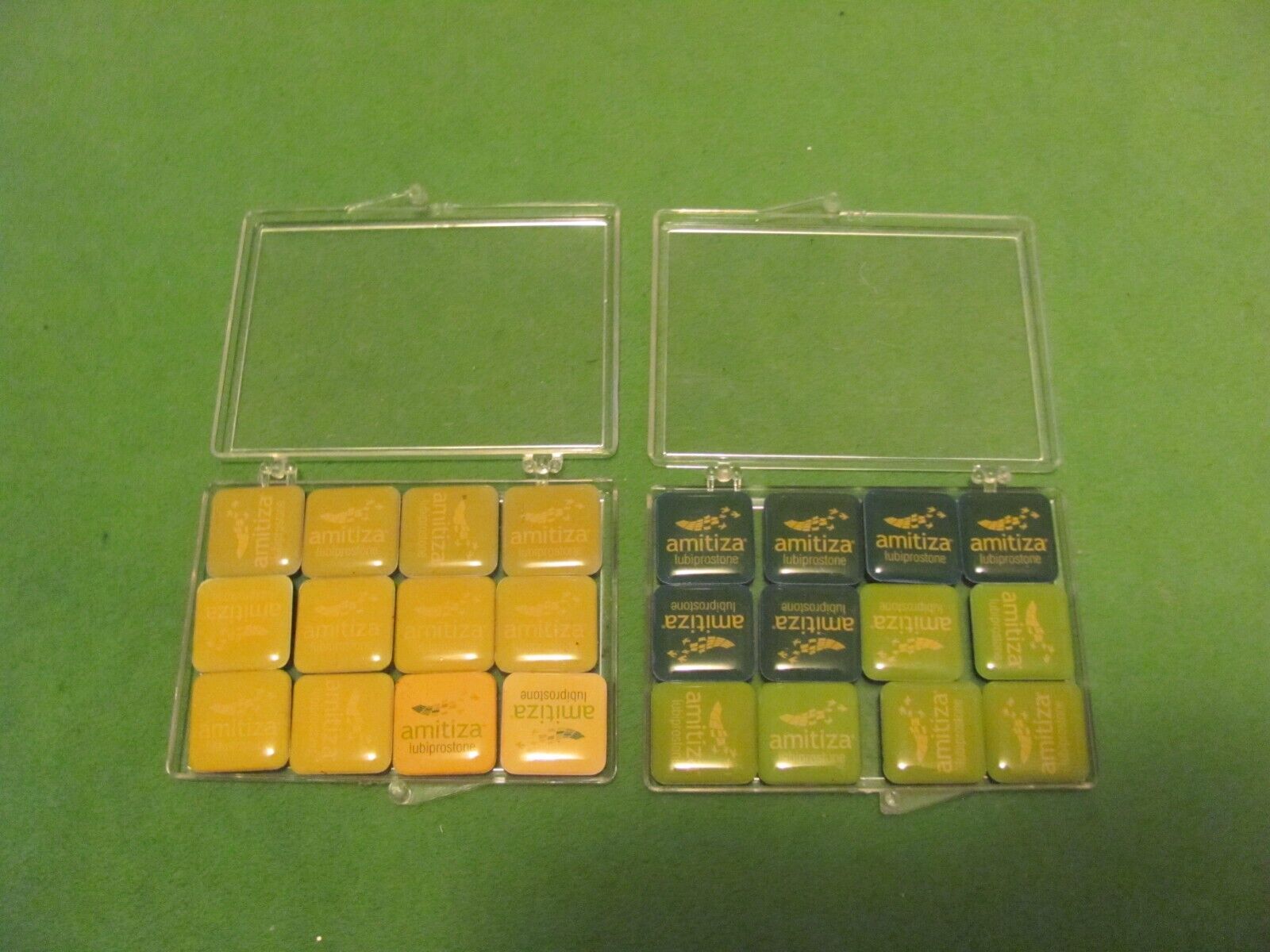 2 set of 12 Amitiza Lubiprostone Drug rep refrigerator clip magnets.