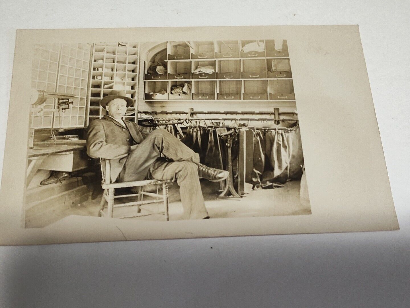 Antique Postcard Man In Chair Post Office?