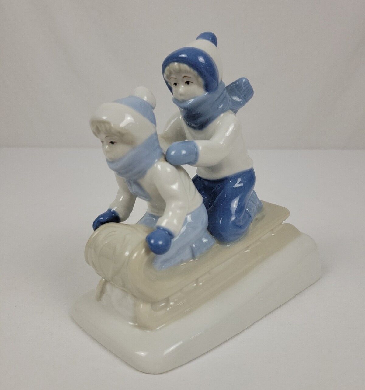 Vintage 1992 Paul Sebastian Sledding Children Porcelain Figurine Winter