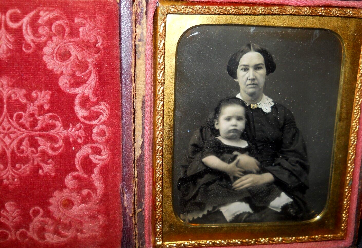 1/6th size Daguerreotype of mom and child in full case, split at hinge