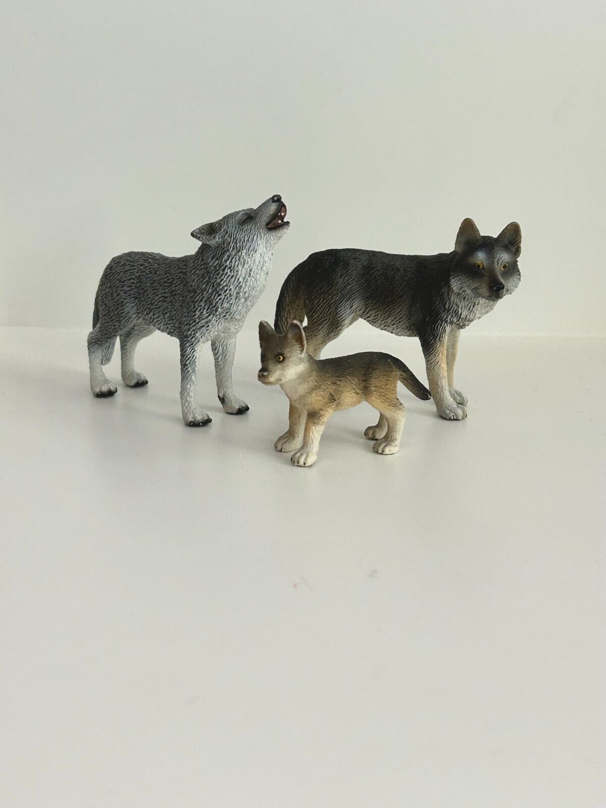 Schleich 2009 Retired Howling Wolf and Retired 2002 Wolf and Pup