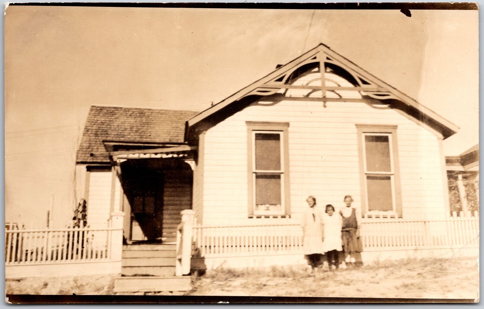 Siblings Portrait In Front Of Their House Antique RPPC Real Photo Postcard