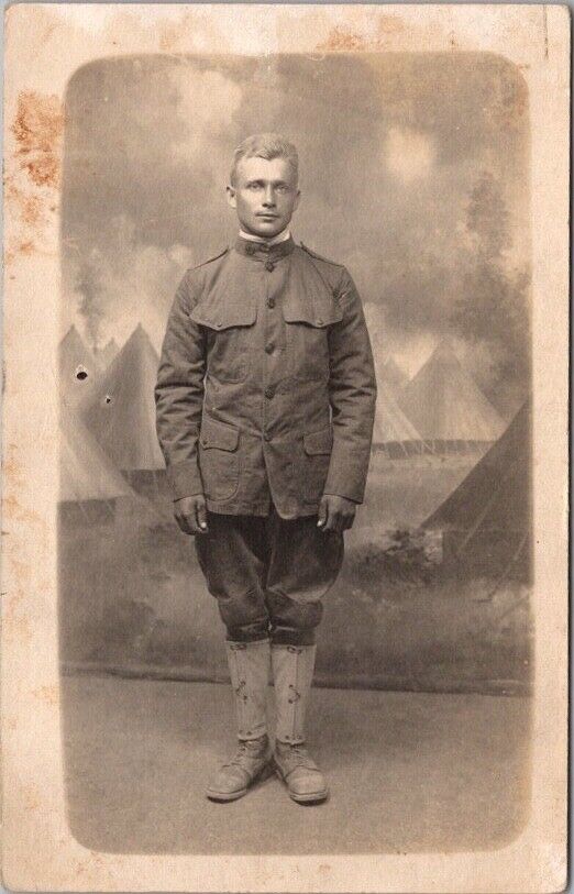 1910s WWI Military Photo RPPC Postcard Young Soldier / Army Tents Background