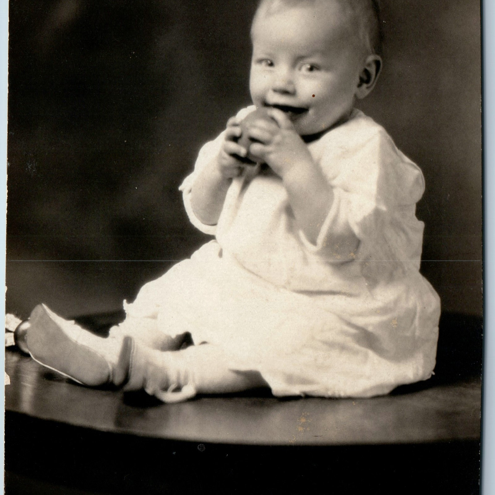 c1910s Smiling Baby Table Portrait RPPC Eating Apple Cute Child Real Photo A260