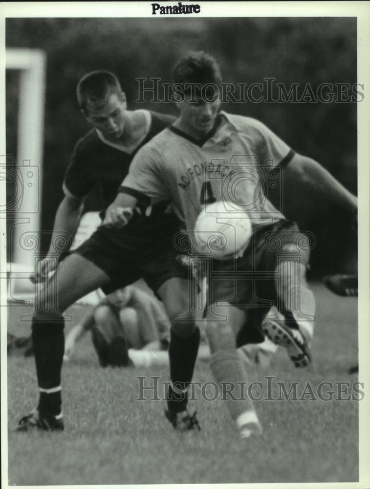 1992 Press Photo Adirondack's #4 kicks ball during soccer match Empire State