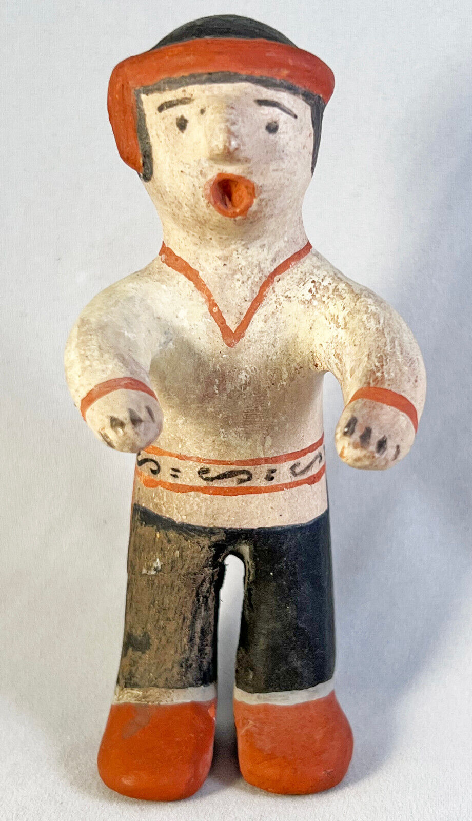 Cochiti man pottery figure by J. Ortiz
