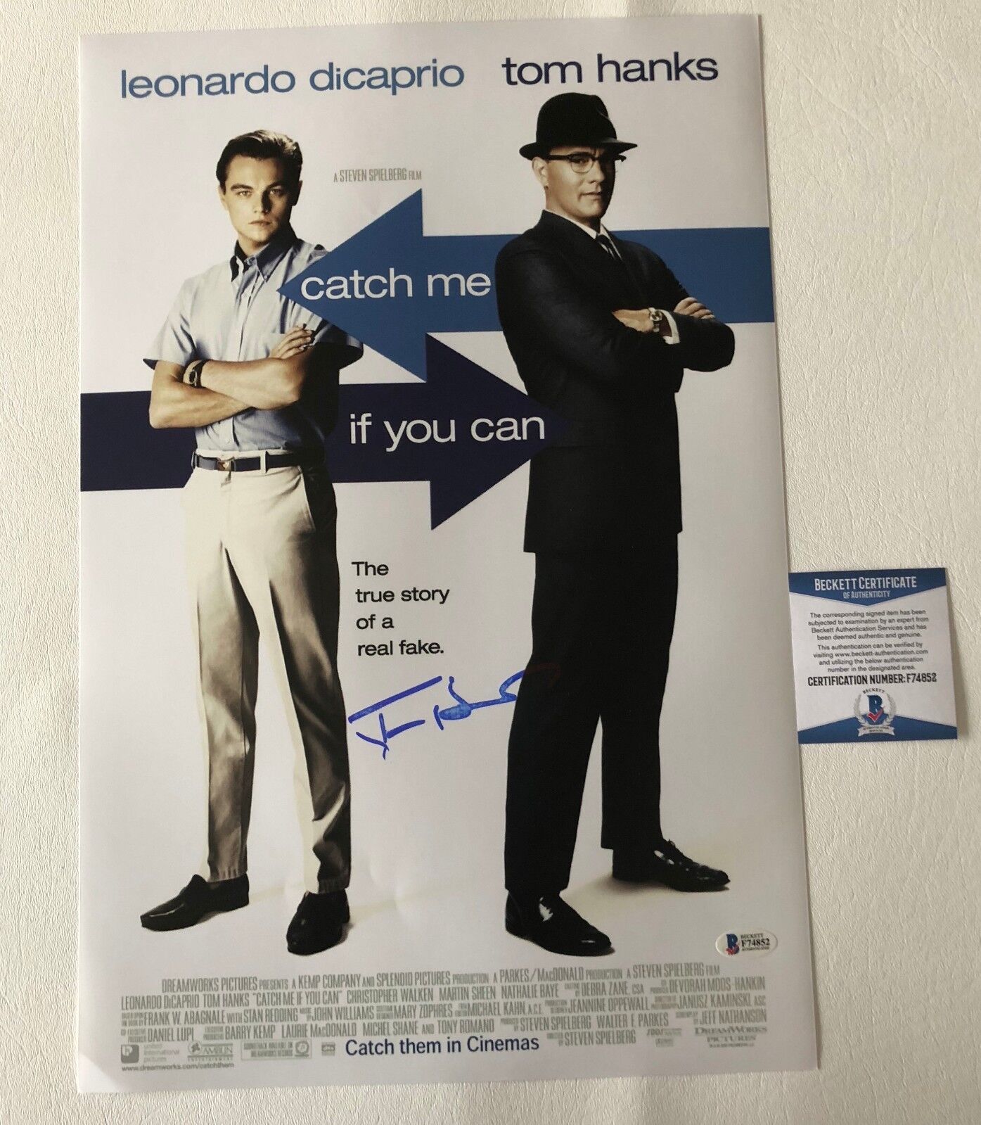 TOM HANKS SIGNED AUTOGRAPHED CATCH ME IF YOU CAN 12X18 PHOTO BECKETT BAS COA 2