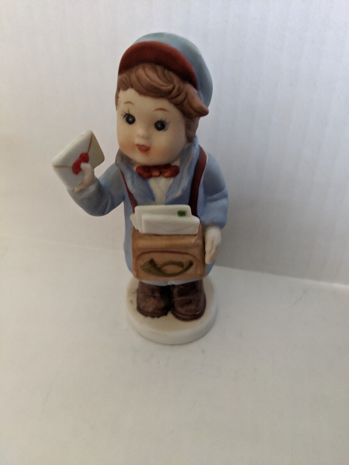 Hummel-like Figurines Boy With Mail. Pre-owned