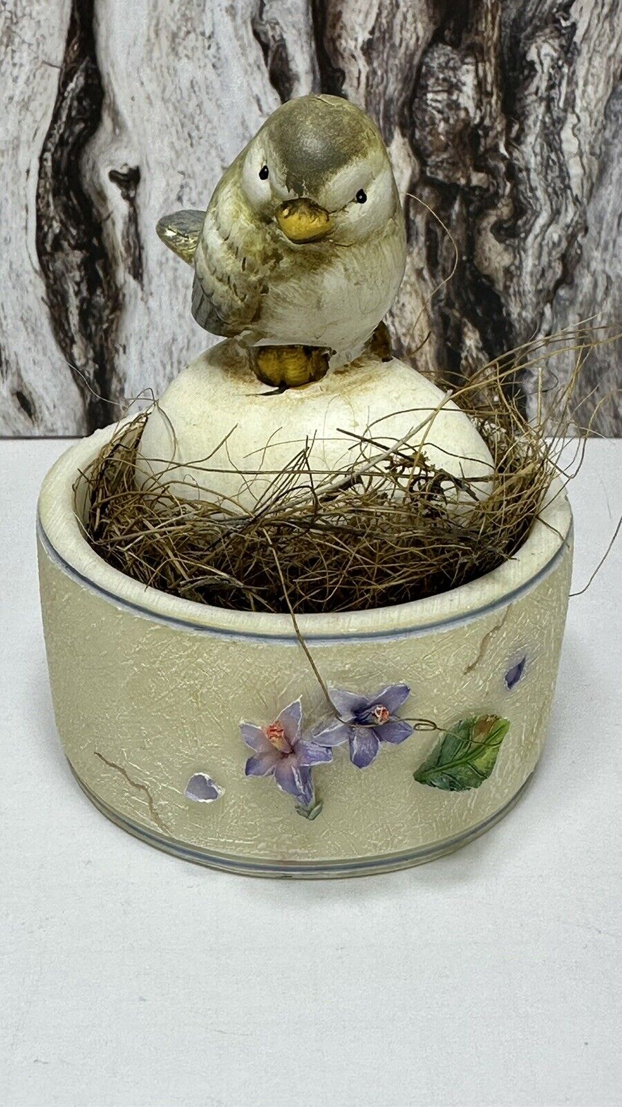A. Richesco Corporation Bird Nesting Upon An Egg In A Flowered Pot