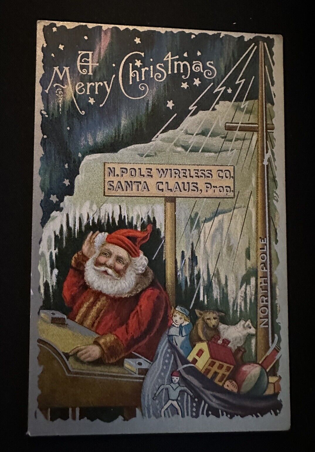 Santa Claus in Sled~Toys North Pole~~Antique Christmas~Postcard~k489