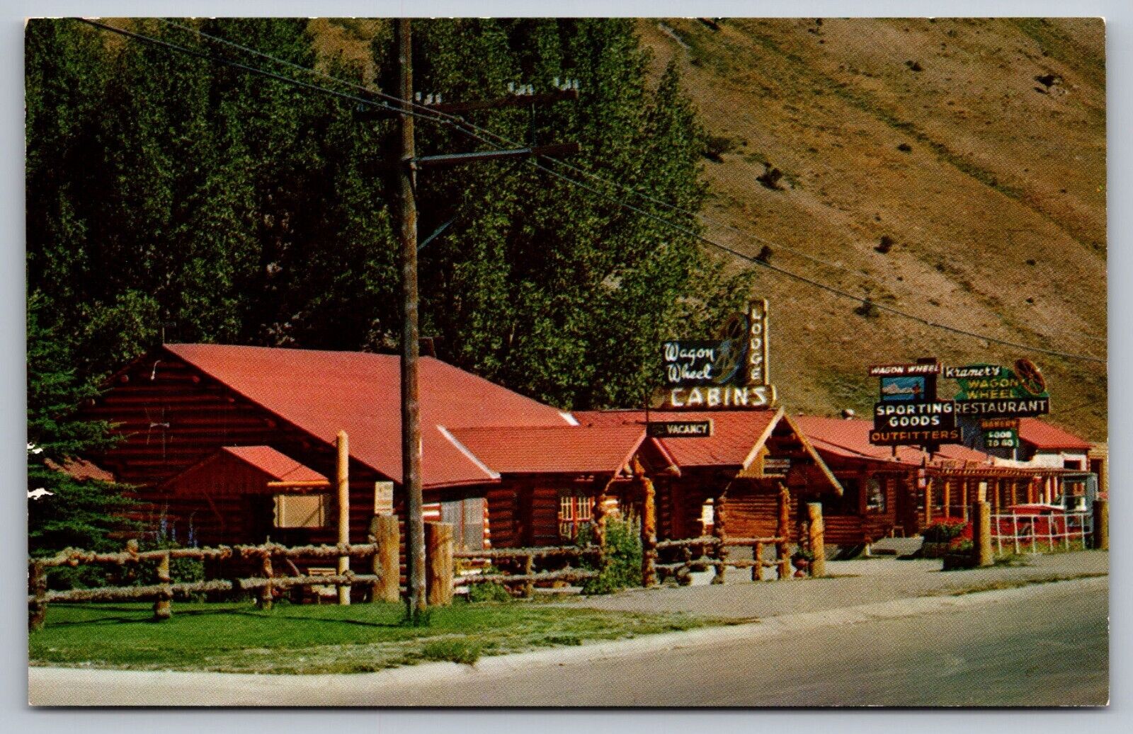 Wagon Wheel Lodge Jackson Wyoming Vintage Postcard c1959