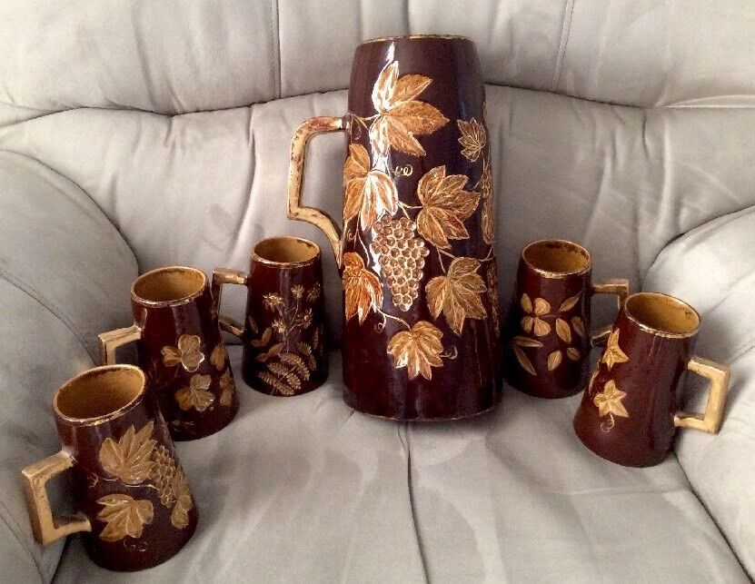 Signed 1886 SCHALLER Pottery Brown & Gold Incised Grapes Stein Set w/5 Mugs