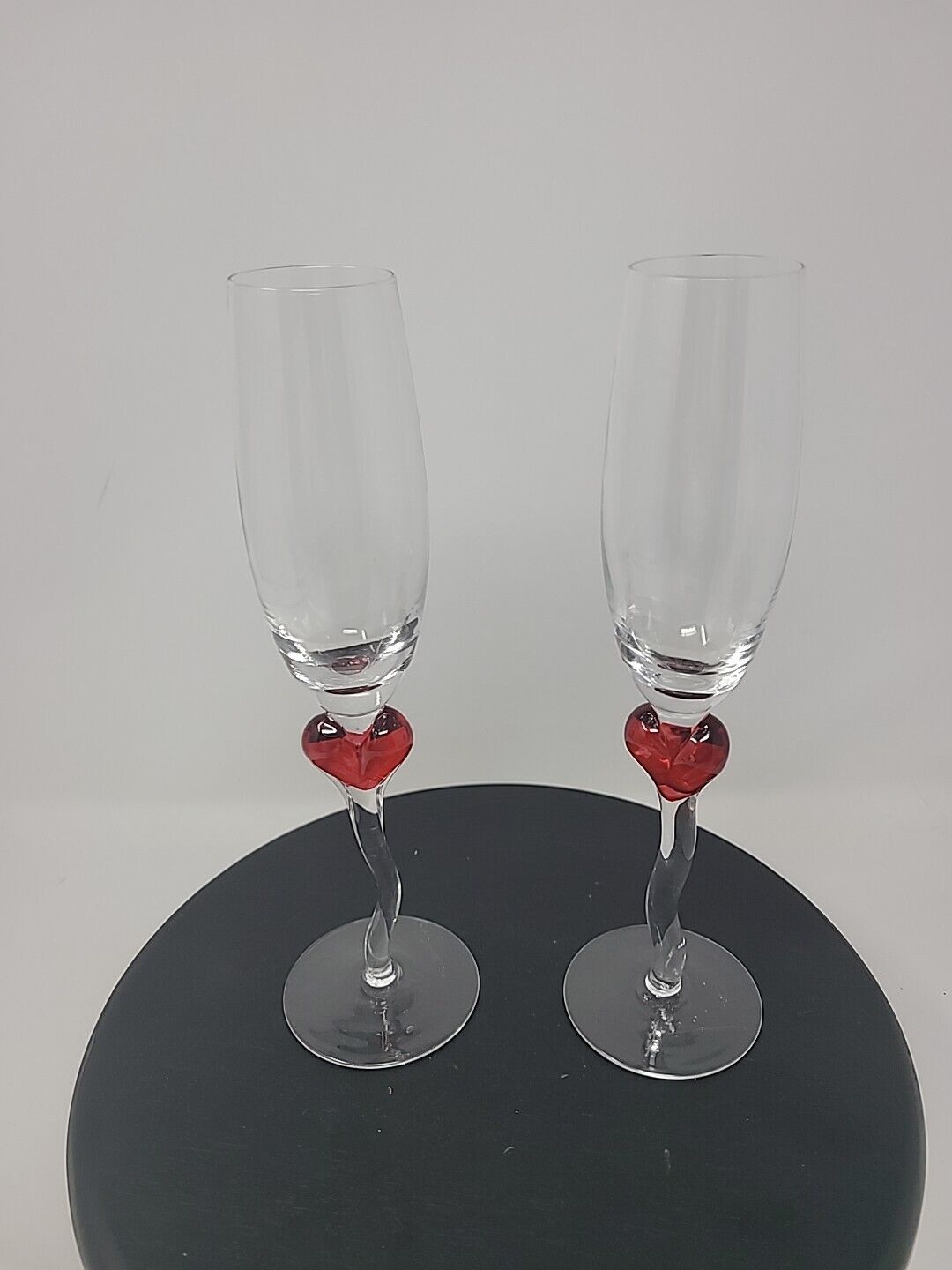Set Of 2 Champagne Flutes With Crooked Stems Red Hearts At Top Of Stem 