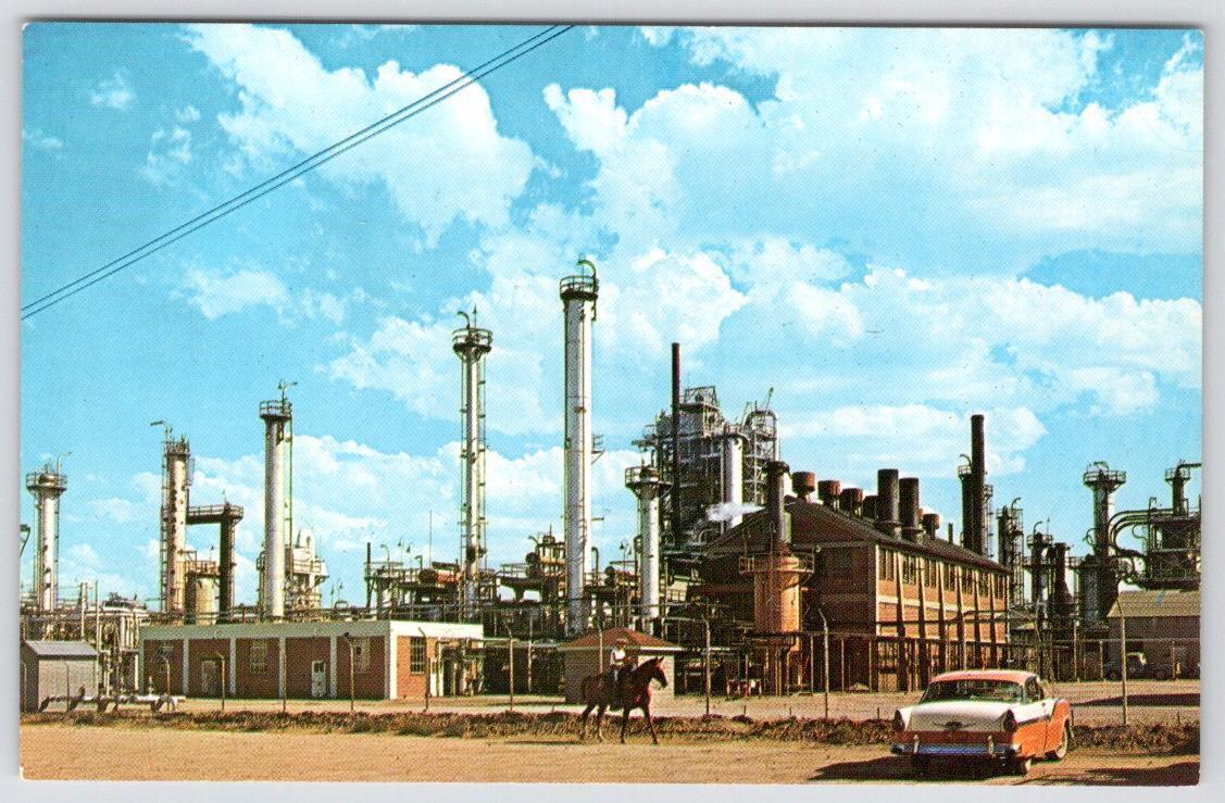 CHEYENNE WYOMING FRONTIER OIL REFINERY OLD CLASSIC CAR MAN ON HORSE POSTCARD