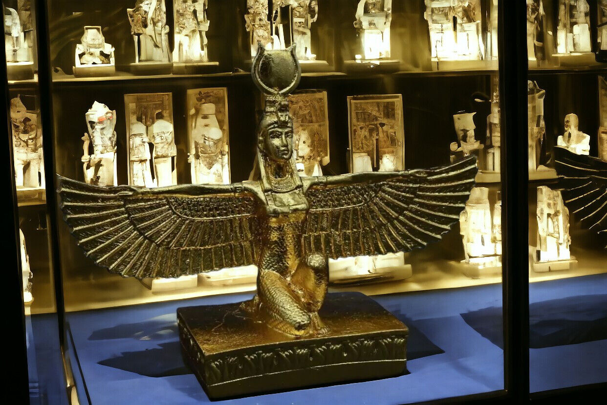 Ancient Egyptian statue of goddess Isis open winged Covered with gold leaf BC