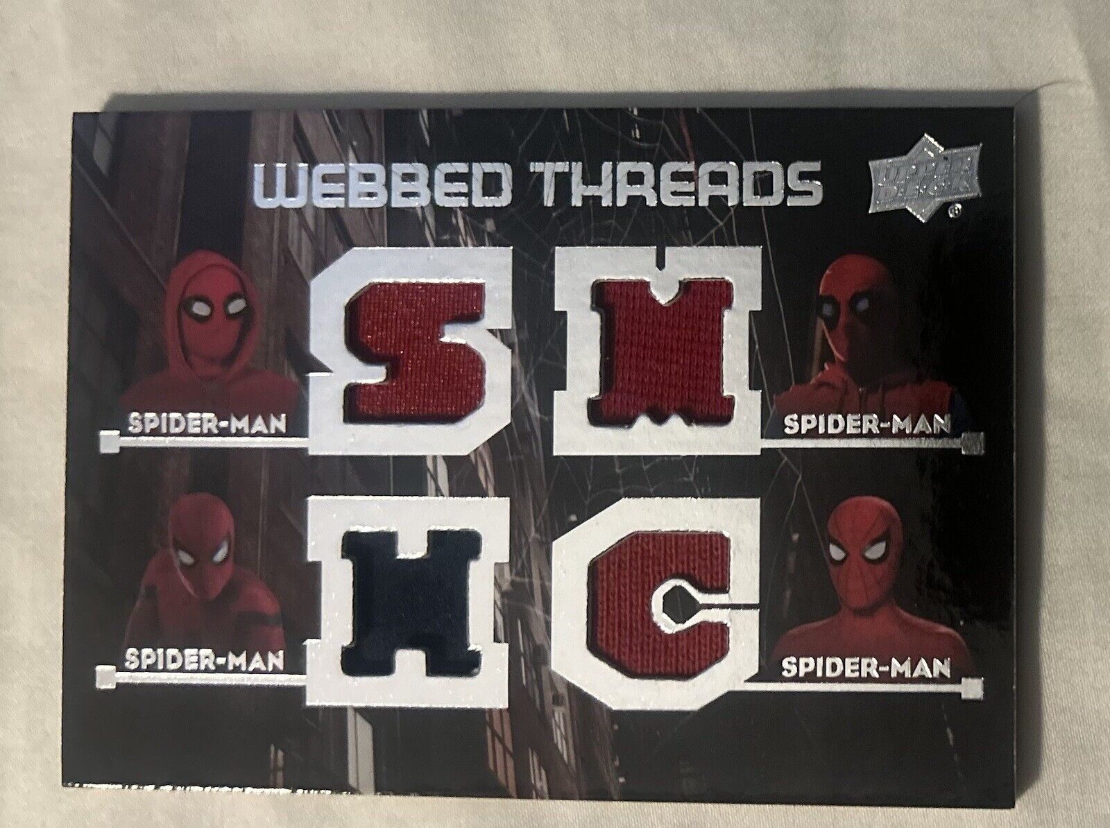 2017 UD Marvel Spider-Man Homecoming Webbed Threads Spider-Man Quad Relic