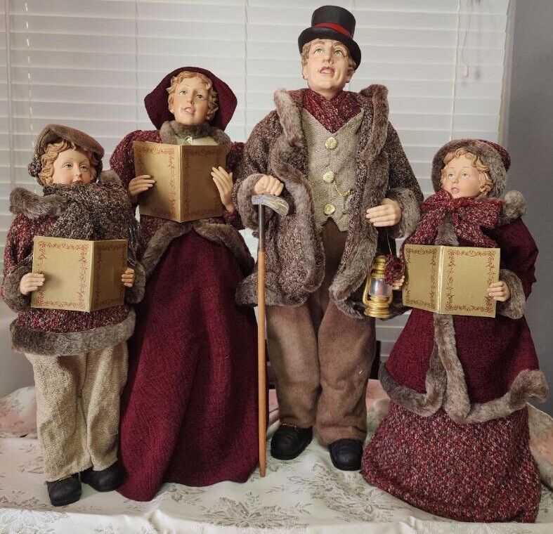 Carolers figurines 4 Christmas real clothing  resin. The tallest  30” Rare