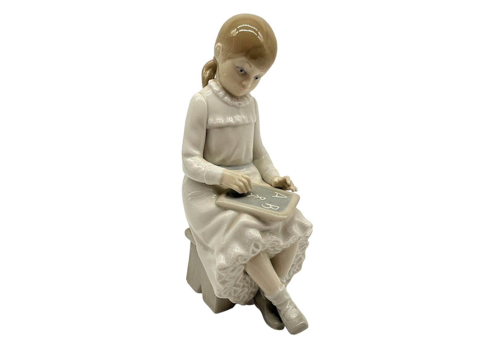 NAO Vintage Figurine of a Young Girl with Slate Board in Her Lap    Collectible