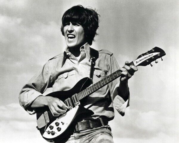George Harrison Beatles era in concert pose playing guitar 8x10 inch photo