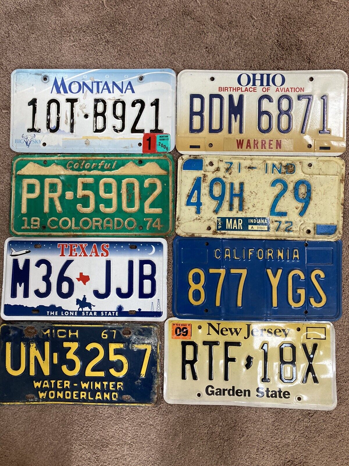 Lot of 8 original EXPIRED license plates - MT- OH-CO-IN-TX-CA-MI-NJ - Nice