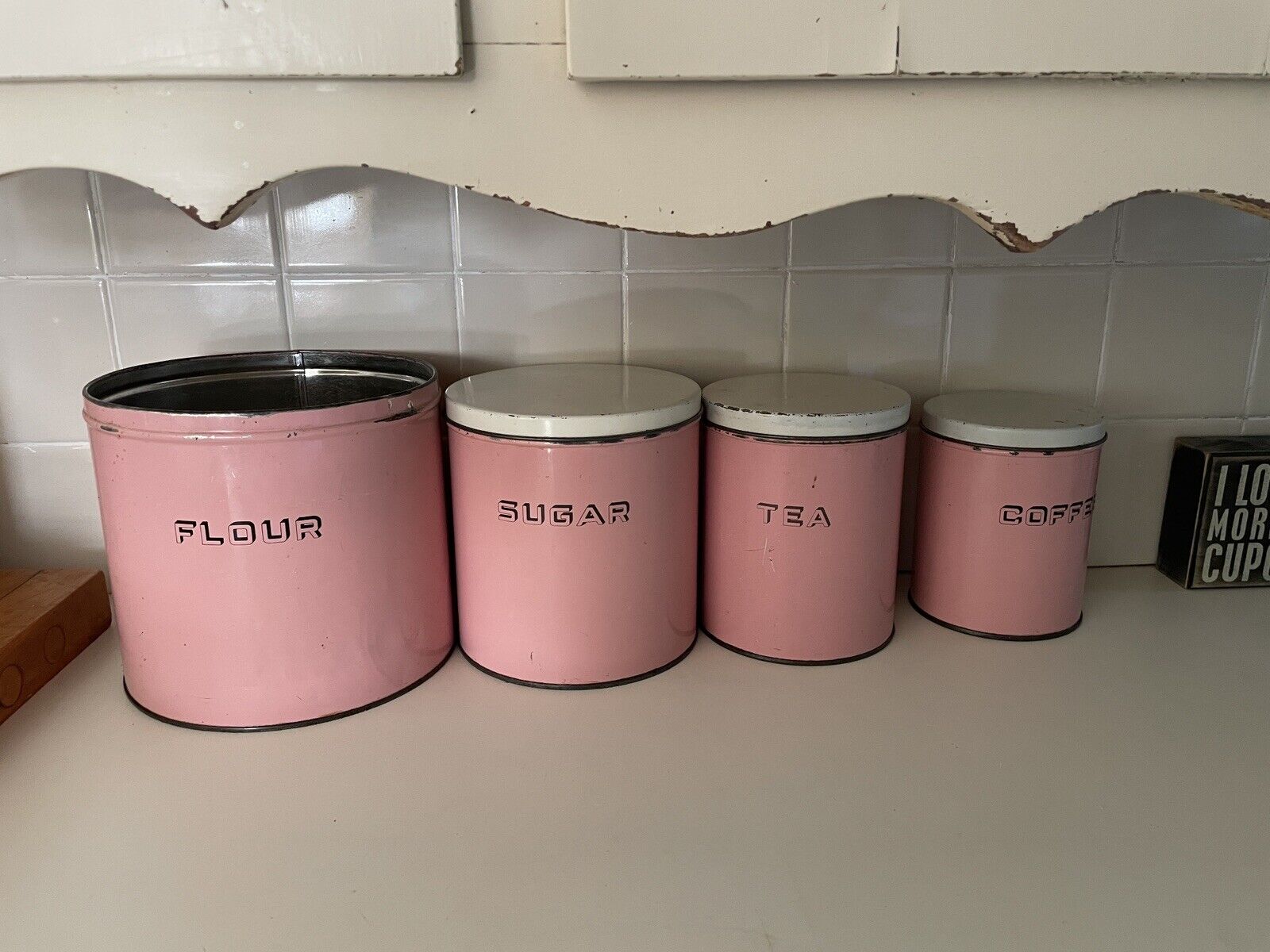 vintage pink metal canisters