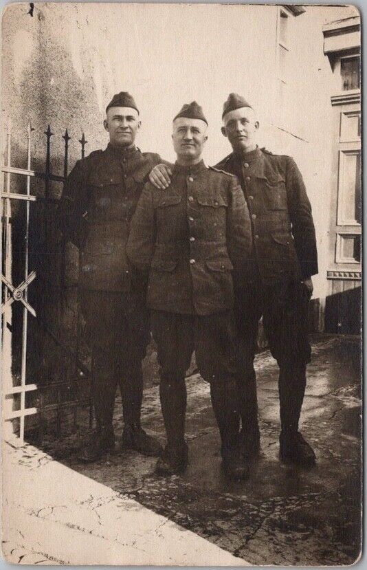 1910s WWI Military Photo RPPC Postcard Three Affectionate Soldiers in Uniform