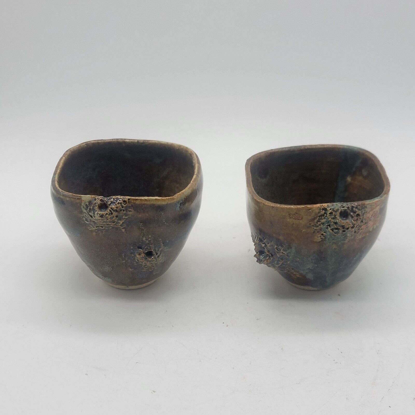 2 wood fired unglazed clay sculpture handmade teacups