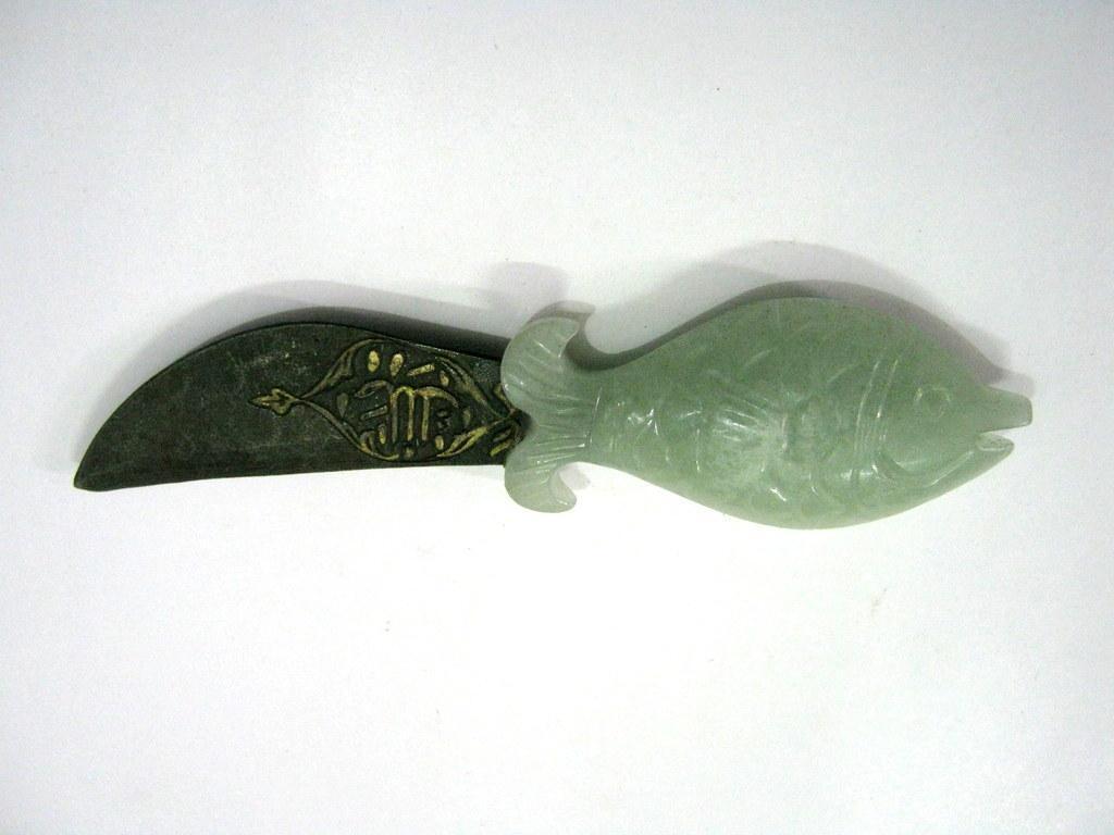 Old jade knife dagger fish handle . Islamic text