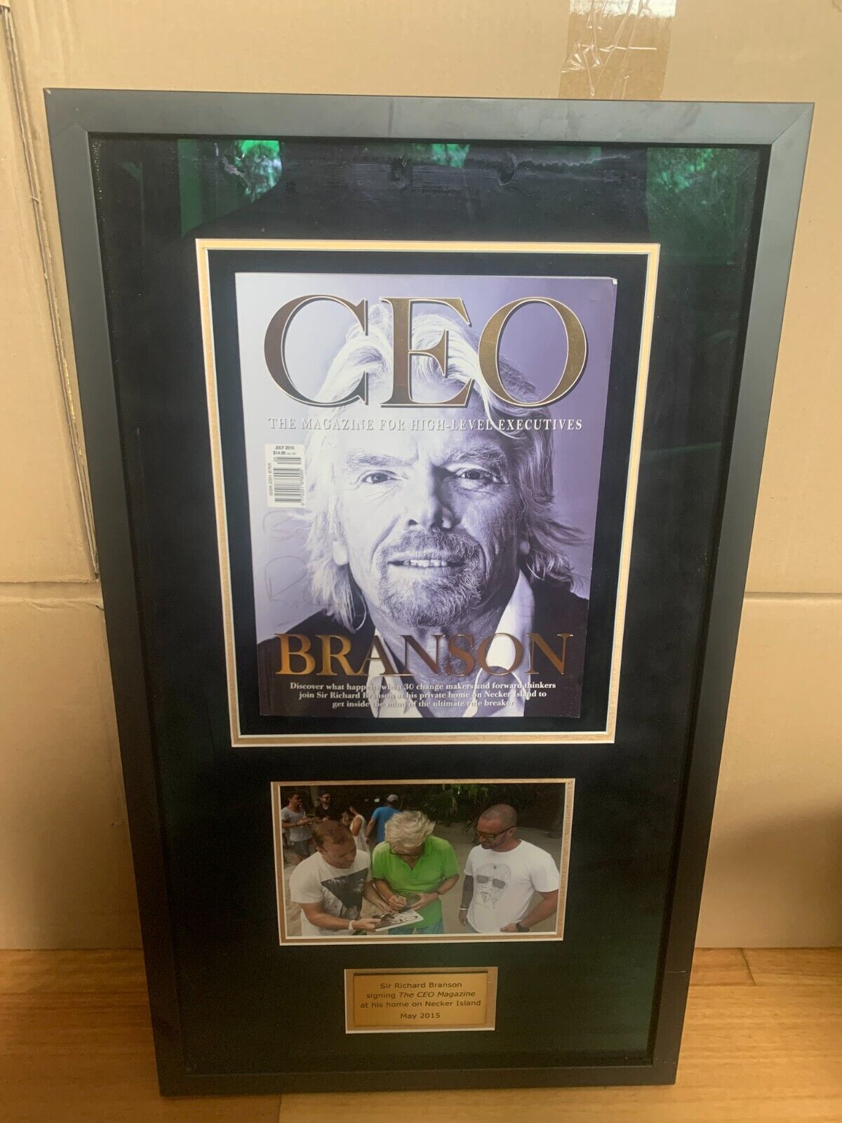 Richard Branson Signed copy of CEO Magazine 2015 with photo and plaque.