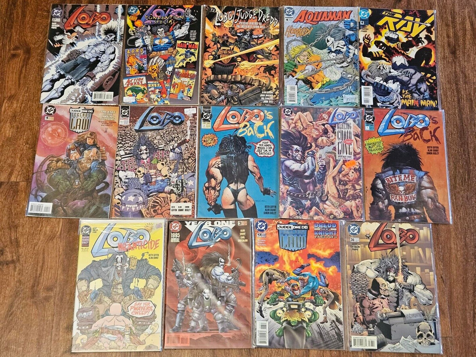 Lot of 14 DC Comics Lobo / Judge Dredd (12), The Ray (1), Aquaman (1), 1991-1997