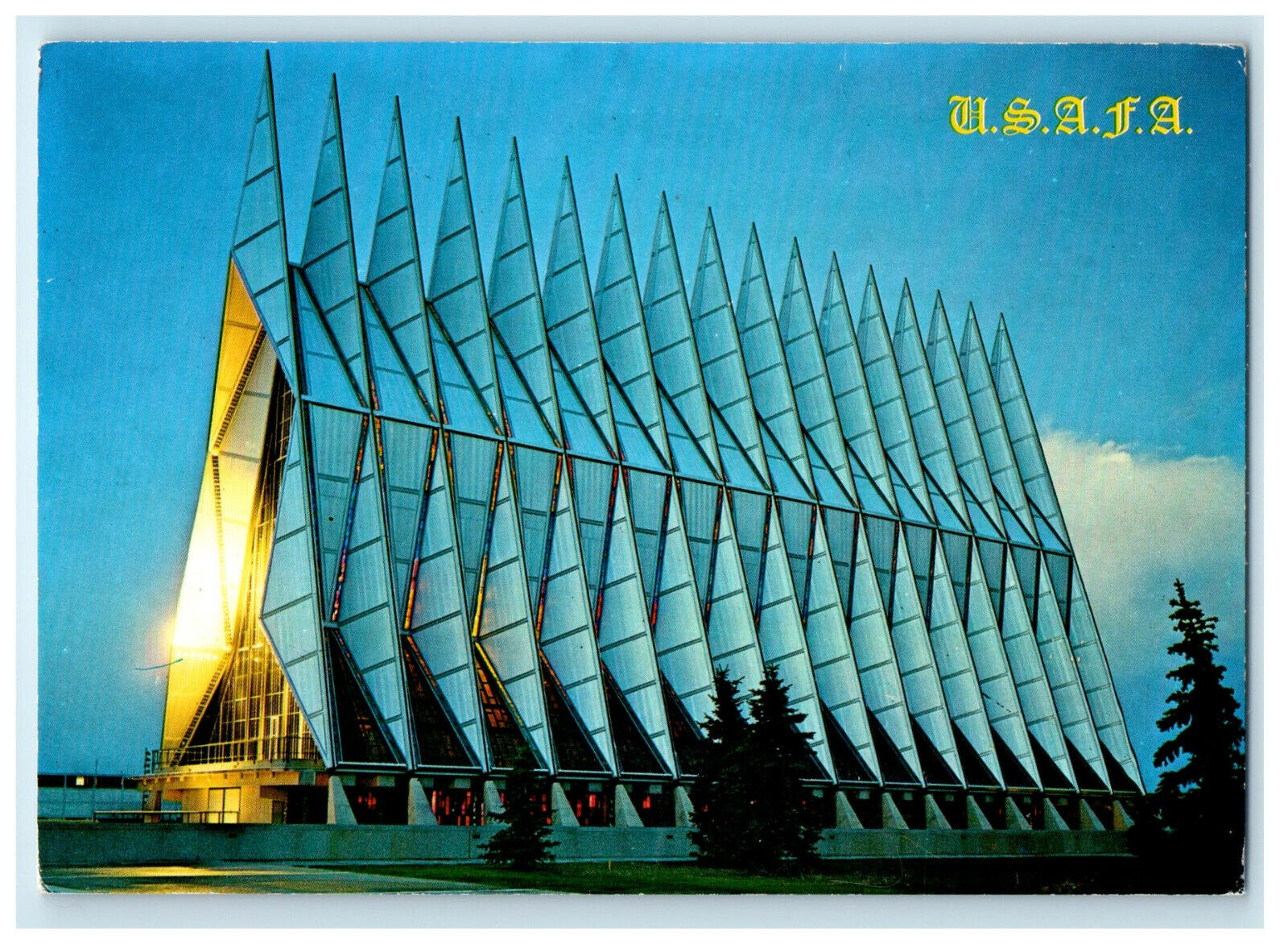 c1960s US Airforce Academy Cadet Chapel at Dusk Colorado CO Postcard