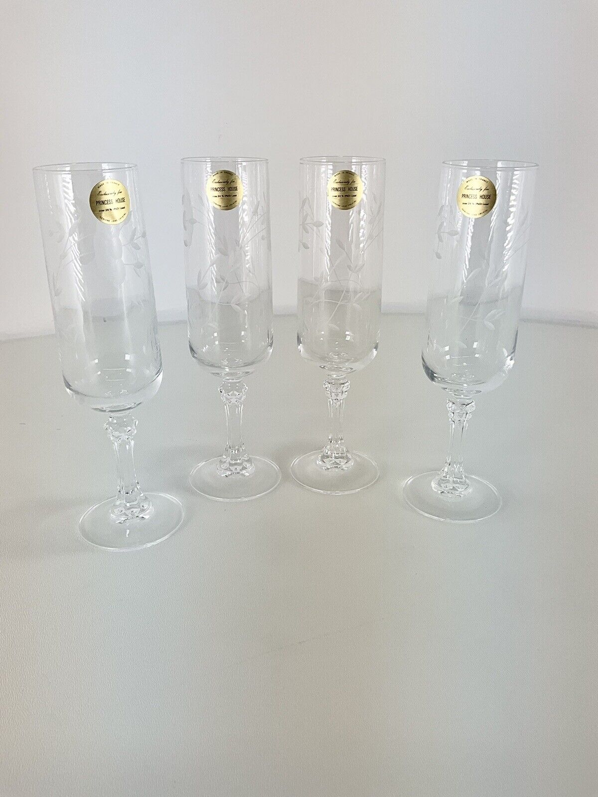 Set Of Four Princess House Lead Crystal Champagne Glasses With Etched Flowers.