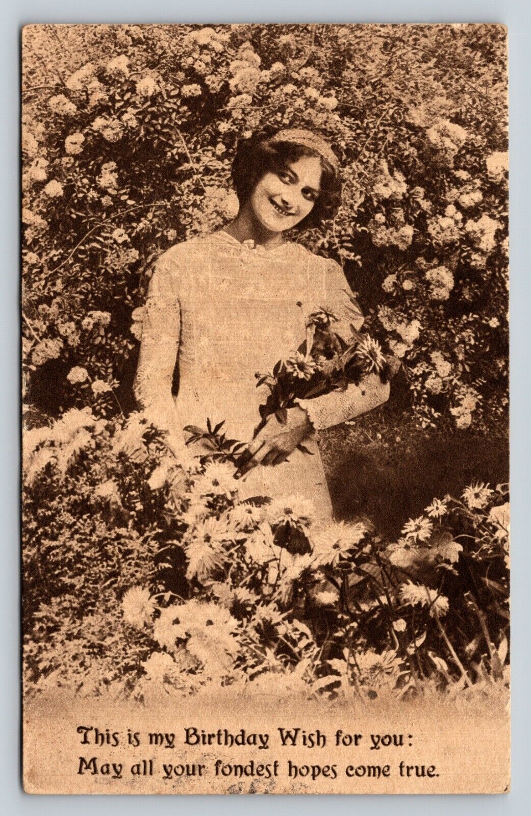 c1915 Smiling Lady Stands in Flowers Birthday Wish ANTIQUE Postcard 1139