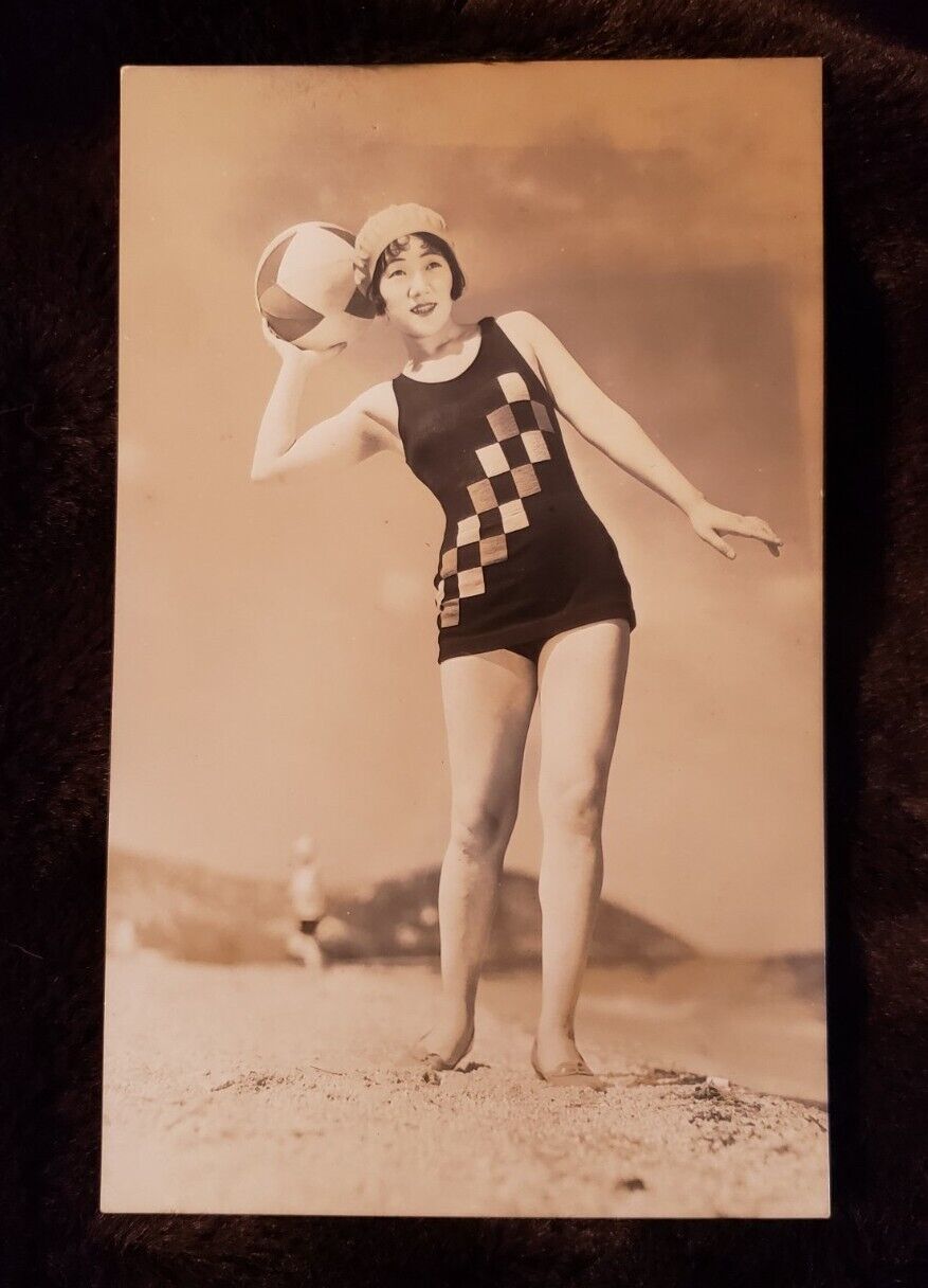 RPPC Pretty Japanese Girl On The Beach With Beachball. Fashion In Swimsuits.