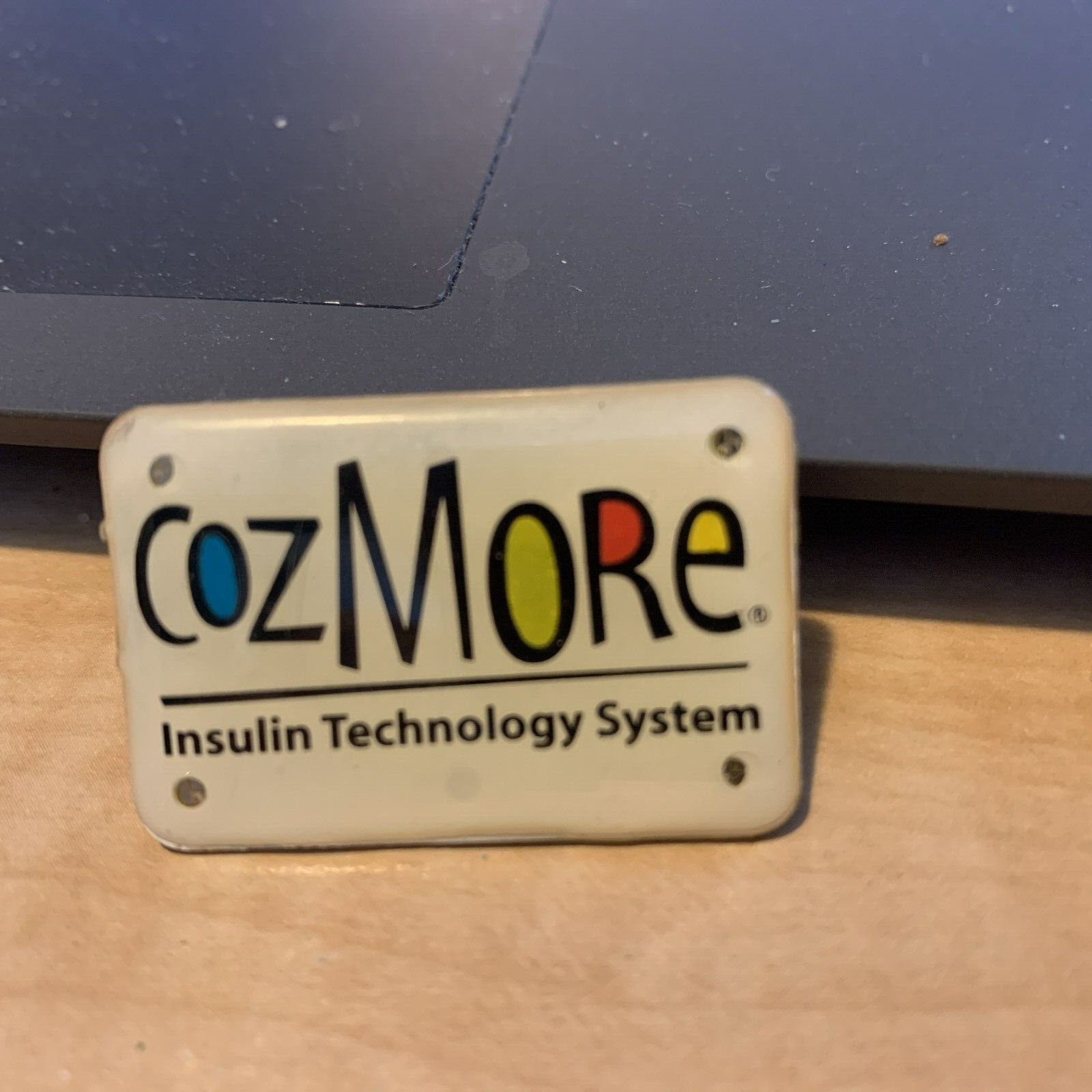 Smiths Medical CozMore Insulin Delivery  Technology System Button  Promotional