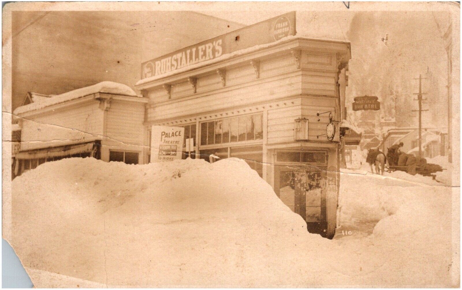 Snow Piles at Corner Store Palace Theatre Sign Juneau Alaska AK 1922 RPPC Photo