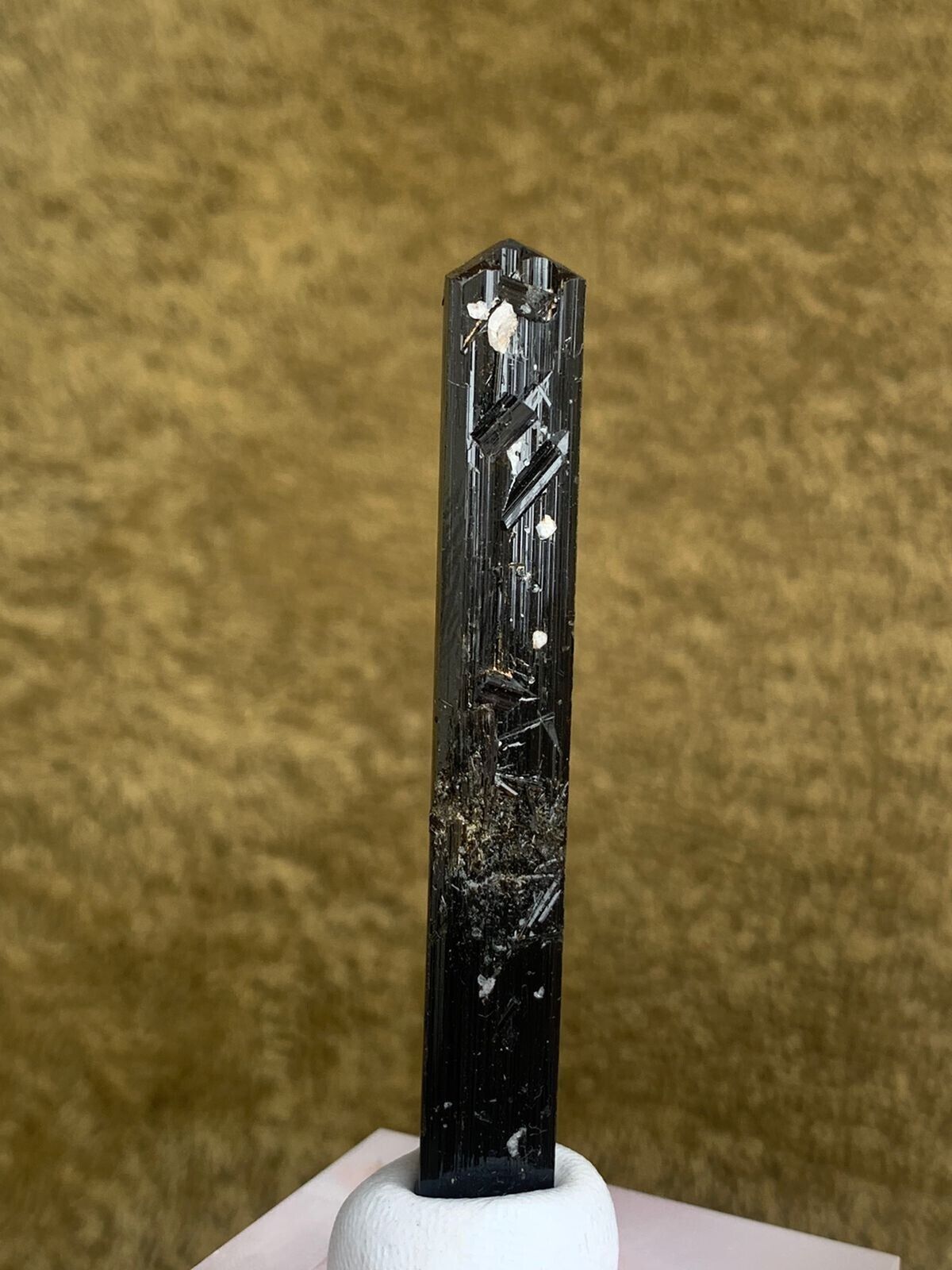 Diamond cut head black tourmaline crystal combine with small rutile skardu