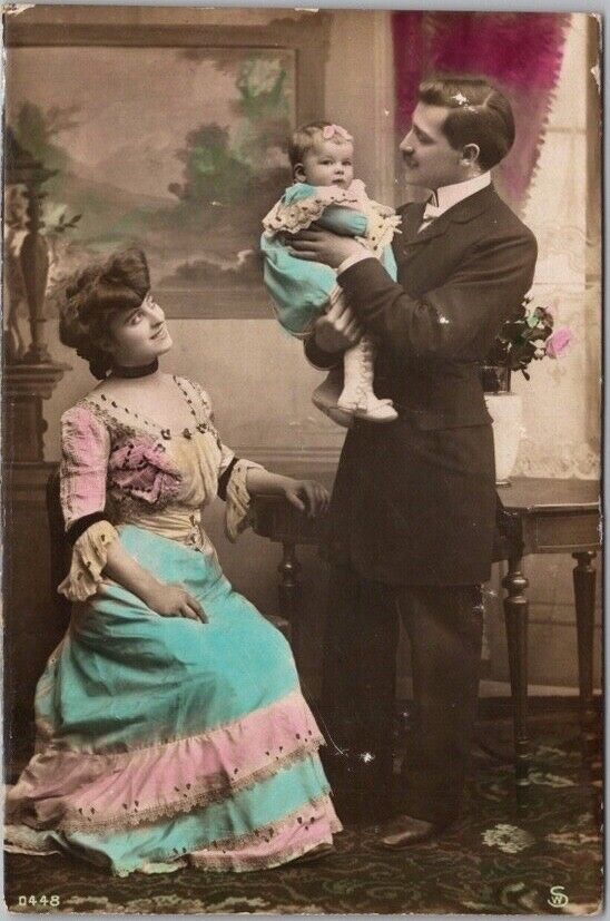 c1900s French RPPC Postcard Family Scene / Couple w/ Baby Hand-Colored Photo