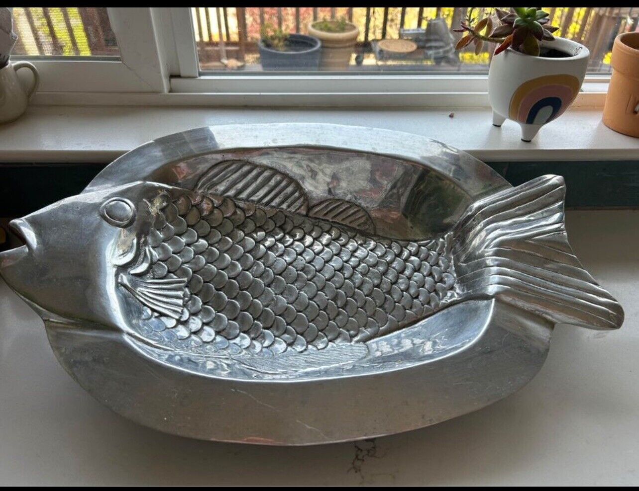 Vintage solid metal fish platter.