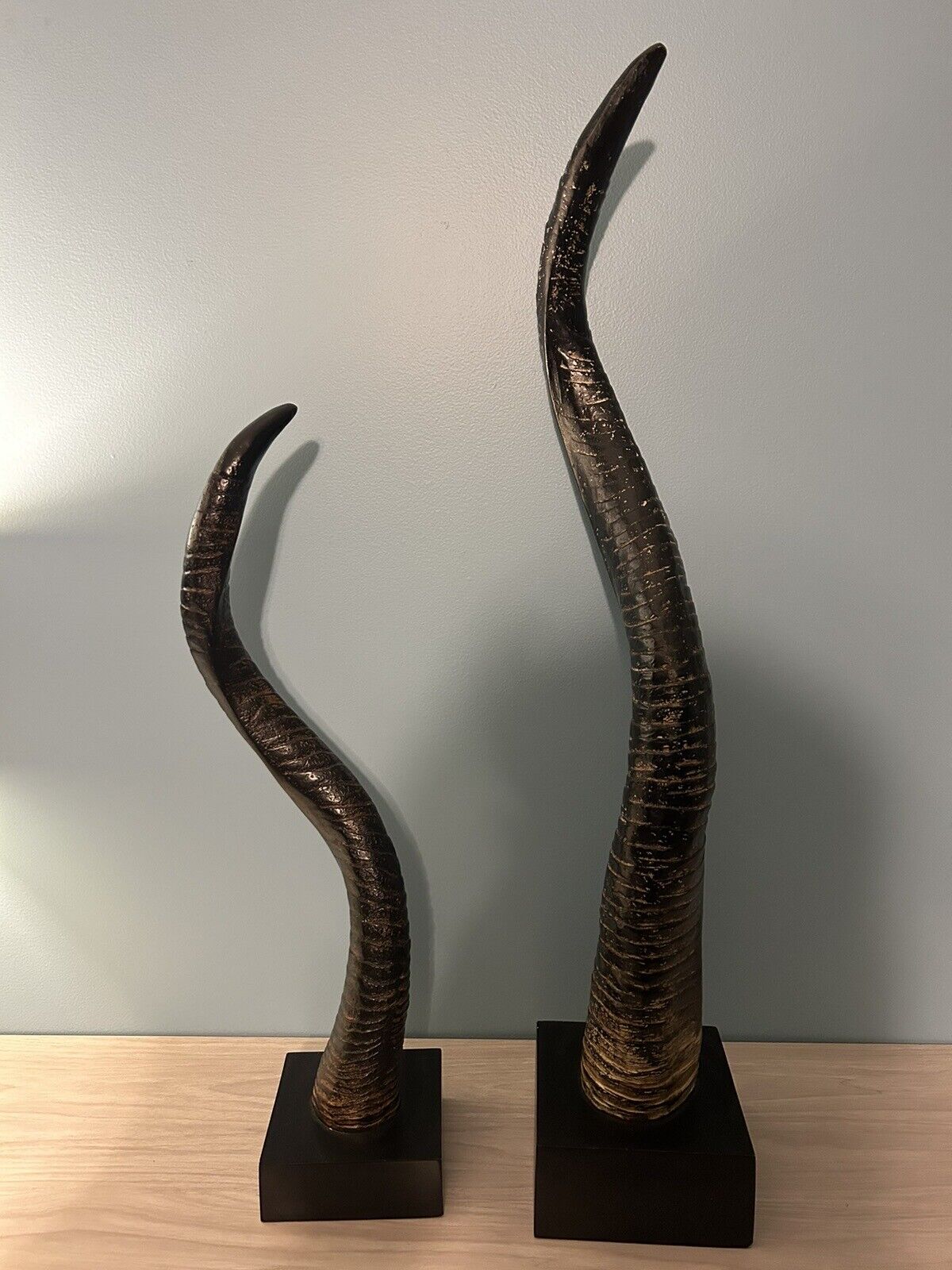 Two African Safari Horn Sculptures with Stands