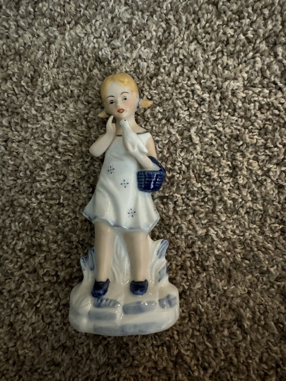 GIRL FIGURINE, with gold trim on neck line and basket handle 6\