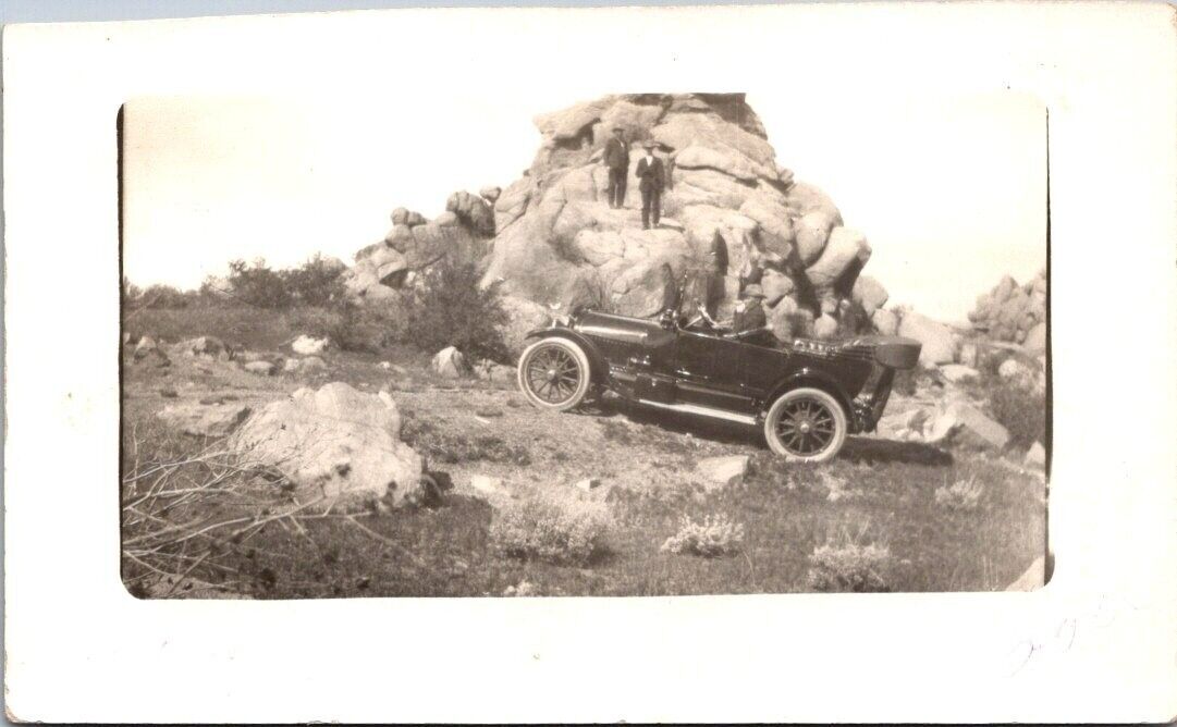 RPPC Near Laramie WY People On Rocks Divide Car Trip  c1915s photo postcard DP4