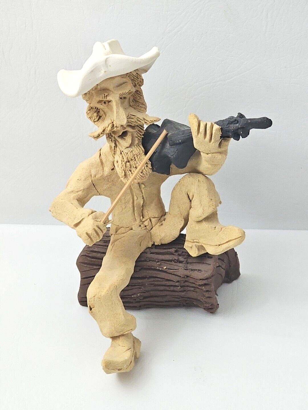 Vintage Tom Schoolcraft Signed Clay Sculpture Cowboy Playing Violin On Log