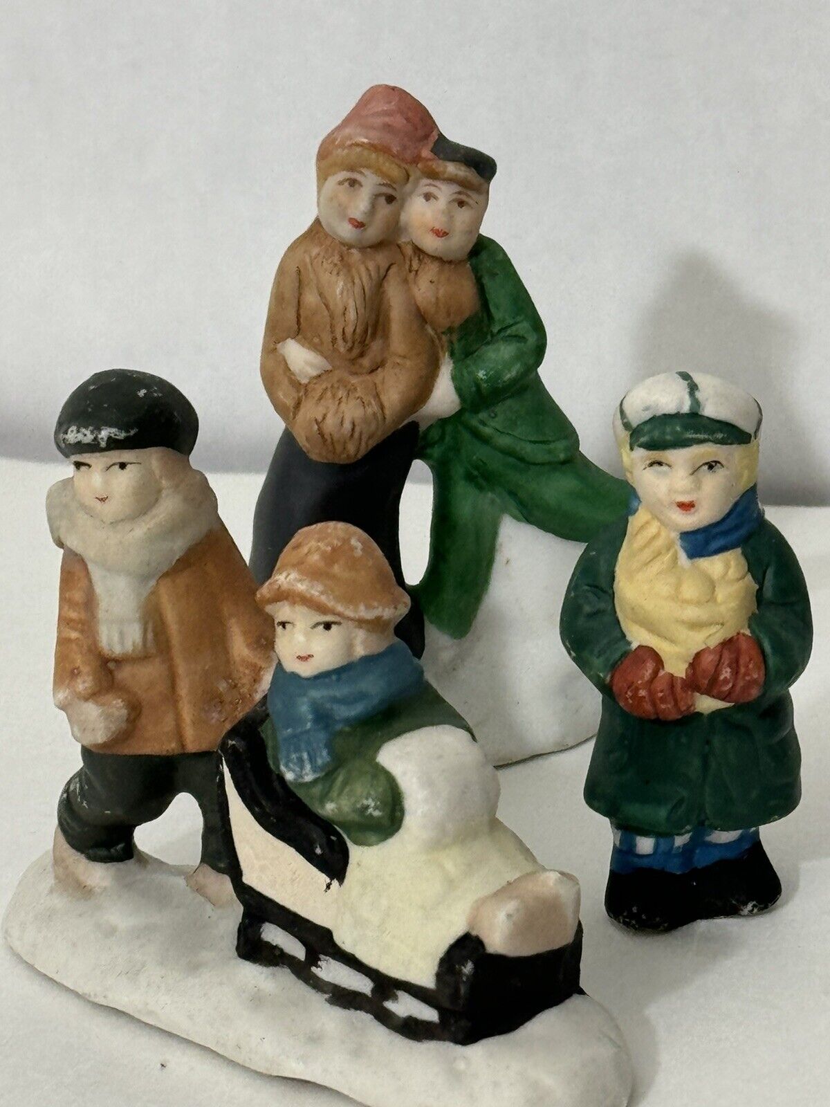 Lot Of 3 Christmas Villages Figurines Skating Sledding Unbranded