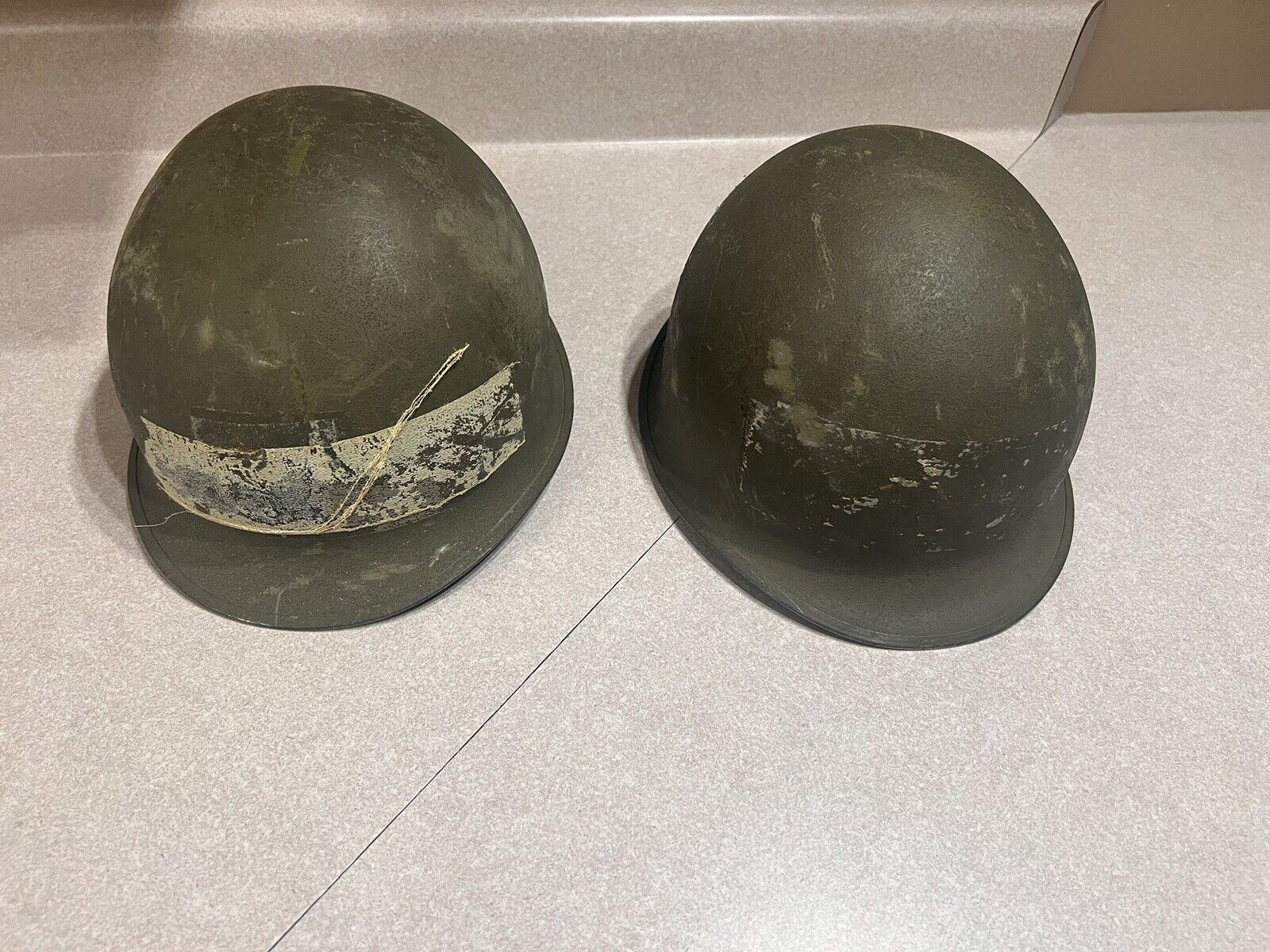 MILITARY SURPLUS 2 VINTAGE HELMETS WITH STRAPS NICE CONDITION