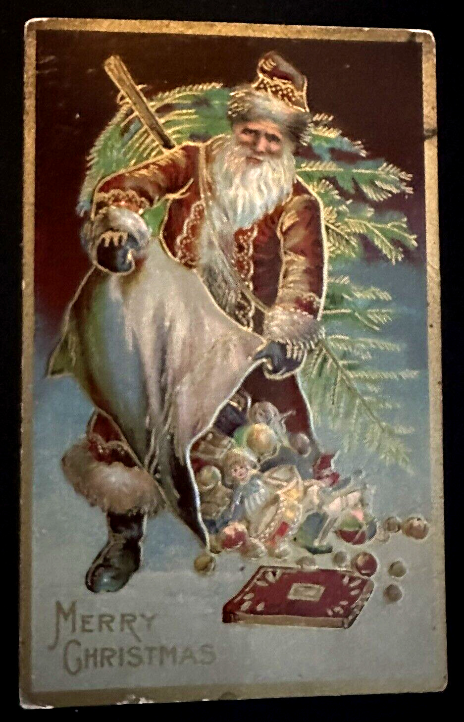 Santa Claus with Tree Pours Toys~Fruit~From Sack~Antique Christmas~Postcard~k386